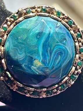 Blue Swirl Round Statement Ring with Green Accent Stones